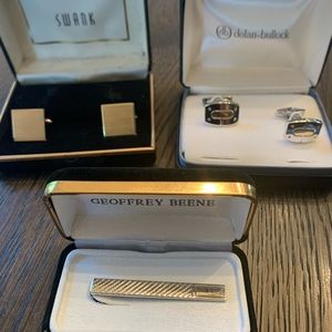 2 cufflinks and 1 tie clip for sale.
